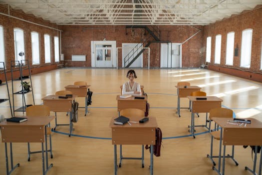 A focused student studying alone in a quiet space