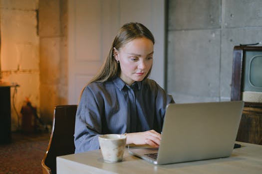 student studying with a drink